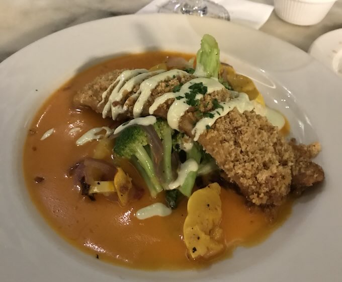 A plate of Creole Stuffed Fish (gulf fish fillet with crawfish cream dressing, sautéed veggies and garlic mashed potatoes, at the Creole House Restaurant, Canal Street, New Orleans.