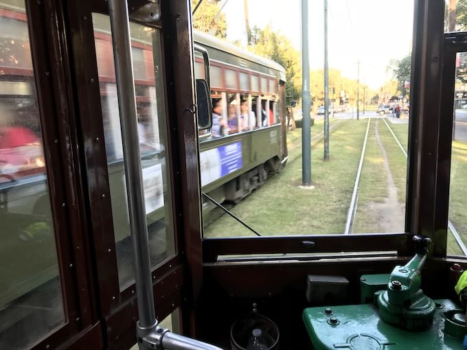 A view down the St Charles tracks from inside a New Orleans Streetcar.